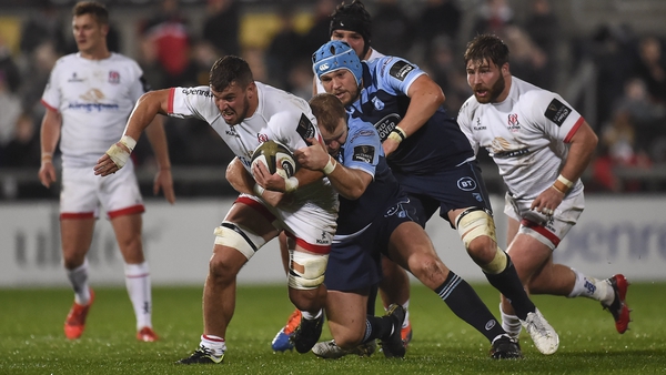 Scott Andrews of Cardiff Blues gets to grips with Ulster's Sean Reidy