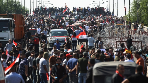Protesters gather on the Al-Jumhuriyah Bridge during an anti-government protest