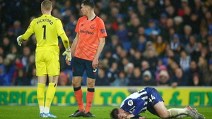 Aaron Connolly went off injured after Michael Keane stood on his leg and conceded a penalty