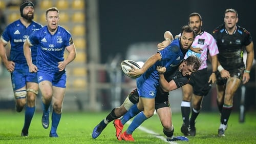 Leinster's Jamison Gibson-Park offloads after coming under pressure from Zebre's Joshua Renton