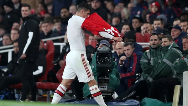Granit Xhaka removed his shirt and appeared to swear at fans after being booed