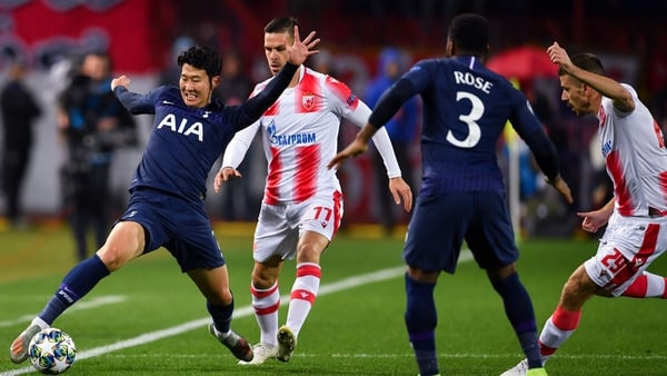 Son Heung-min stretches to keep the ball in play in Belgrade