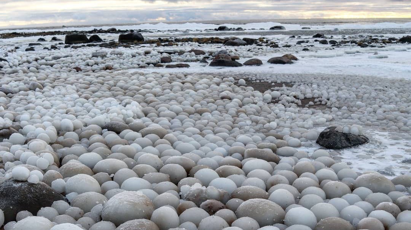 Photographer Captures Picture of Stunning 'Ice Ball' Phenomenon on Finnish  Beach