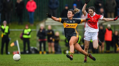 Mourneabbey's Doireann O'Sullivan gets a shot off despite the attentions of Donaghmoyne's Fiona Courtney