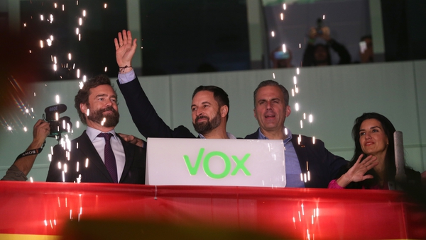 Vox party members including leader Santiago Abascal celebrate in Madrid