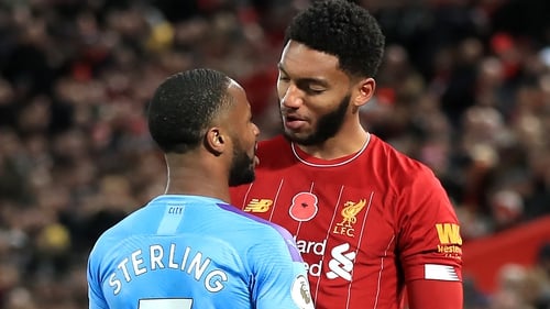 Liverpool's Joe Gomez and Manchester City's Raheem Sterling