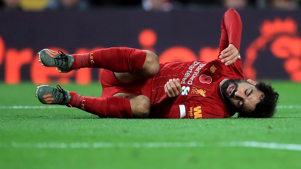 Mohamed Salah appeared to injure his left ankle in Liverpool's win over Manchester City on Sunday