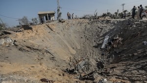 A crater left by a bomb that hit the house of Rasmi Abu Malhous, who Israel described as an Islamic Jihad commander
