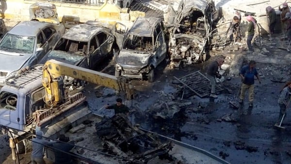 The bomb, which struck a bus and taxi station in the town, also wounded 33 people