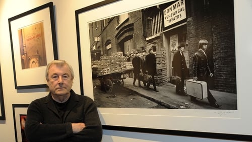 Terry O'Neill photographed with one of his Rolling Stones images in New York in May 2012
