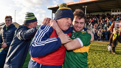 Clonmel Commercials manager Charlie McGeever celebrates with Ross Peters