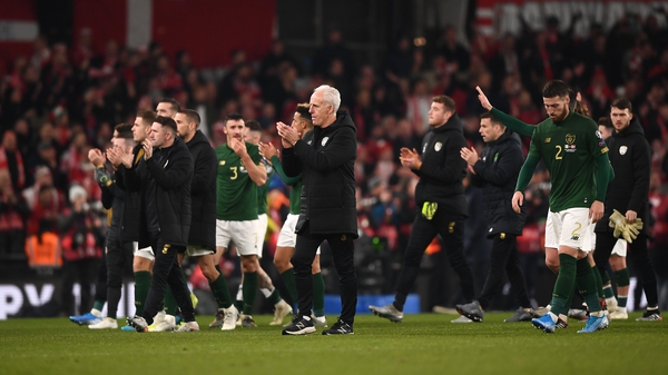 Mick McCarthy and his players applaud the fans after the draw with Denmark