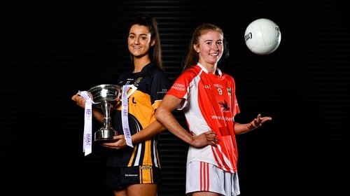 Eimear Meaney of Mourneabbey (L) and Louise Ward, captain of Kilkerrin-Clonberne, with the Dolores Tyrrell Memorial Cup