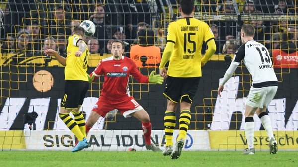 Reus heads the late equaliser for Dortmund