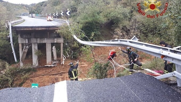 Rain and floods hit Italy and France as landslide sweeps away motorway bridge