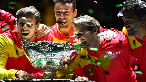 The Spanish team celebrate with the trophy