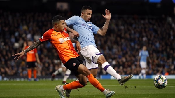 Manchester City's Gabriel Jesus (R) and Shakhtar Donetsk's Dodo Dos Santos battle for the ball