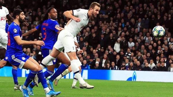 Harry Kane heads home his side's fourth goal