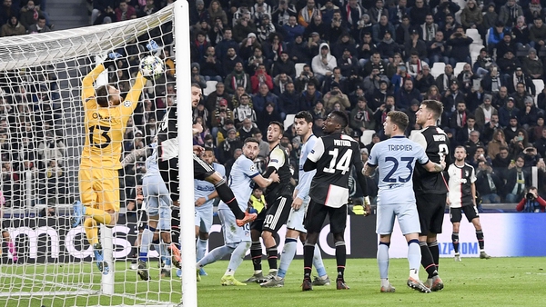Paulo Dybala of Juventus scores from a near impossible angle