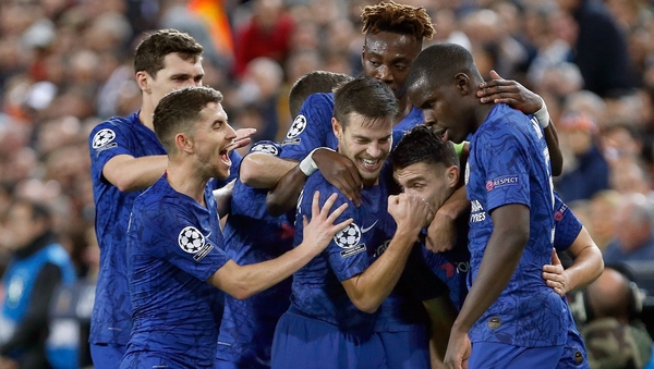 Mateo Kovacic is mobbed by his Chelsea team-mates after cancelling out Valencia's opener