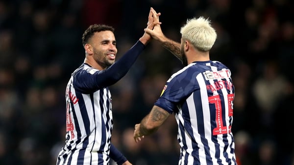 West Bromwich Albion's Charlie Austin (right) celebrates scoring his side's fourth goal of the game with team mate Hal Robson-Kanu