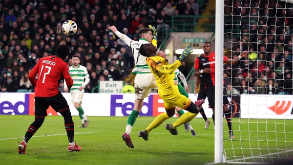 Celtic's Ryan Christie and Rennes goalkeeper Edouard Mendy battle for the ball