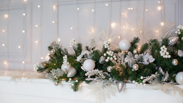 This Christmas pine garland complements a white background (iStock/PA)