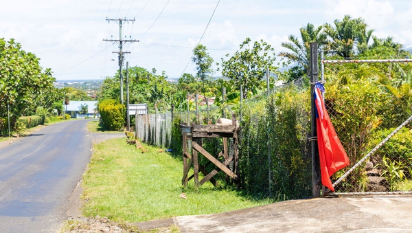A red flag hanging outside a home in Samoa indicating the residents have not been vaccinated for measles