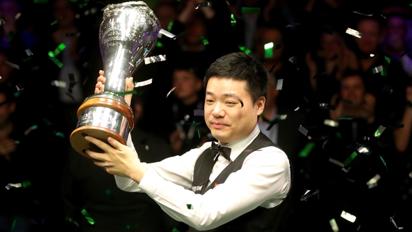 Ding Junhui celebrates his victory at the Barbican