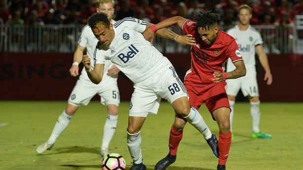 Will Seymore (left) in action for former club Vancouver