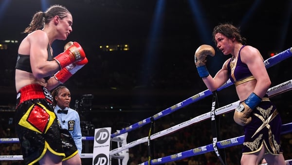 Katie Taylor (R) and Delfine Persoon during their fight at Madison Square Garden