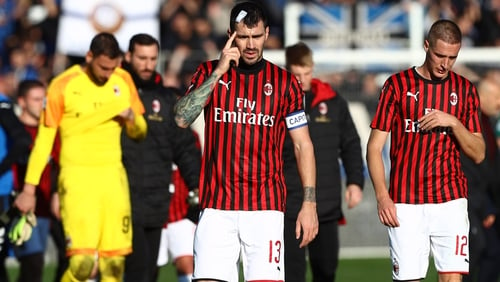 Captain Alessio Romagnoli and Andrea Conti following the 5-0 thrashing by Atalanta