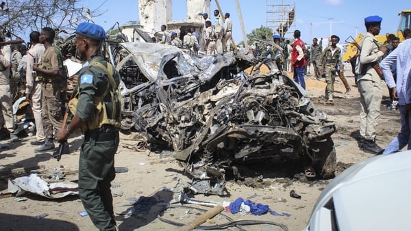 The blast left the wreckage of surrounding vehicles at the busy checkpoint and crossroads