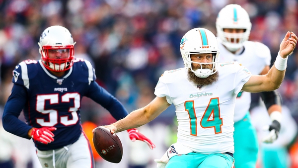 Ryan Fitzpatrick (r) set up the pass that saw Miami Dolphins defeat New England Patriots