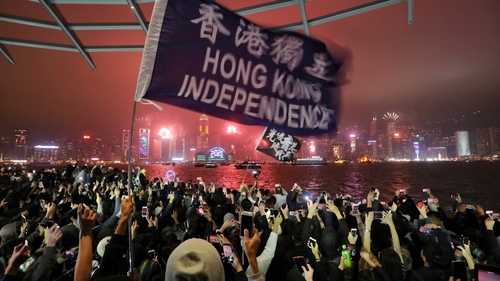 Hong Kong police arrest at least 14 veteran pro-democracy lawmakers