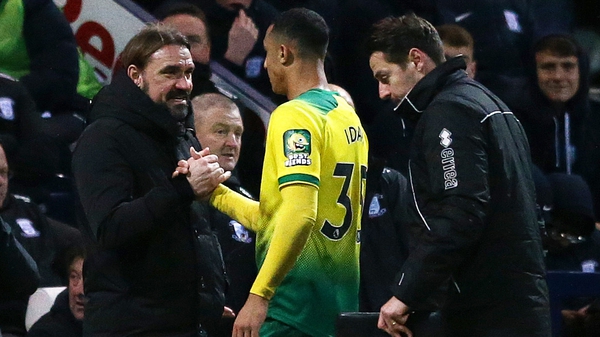 Adam Idah is congratulated by his manager following his hat-trick display for Norwich