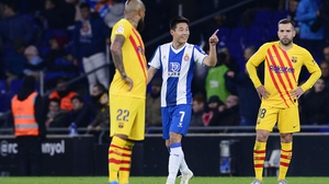 Wu Lei celebrates his equaliser against Barcelona