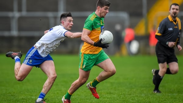 Dáire Ó Baoill of Donegal leaves Monaghan's Shane Carey trailing in his wake