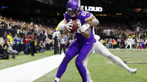 Kyle Rudolph #82 of the Minnesota Vikings makes the game-winning touchdown reception against P.J. Williams #26 of the New Orleans Saints
