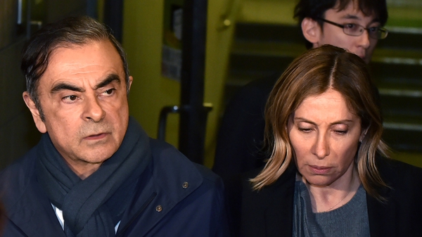 Former Nissan Chairman Carlos Ghosn's bail conditions included restrictions on contact with his wife Carole
