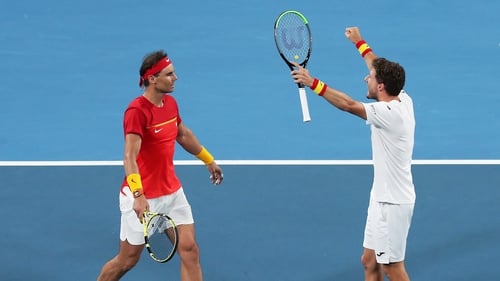 Rafael Nadal and Pablo Carreno Busta celebrate their success over Sander Gille and Joran Vliegen