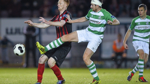Gary Shaw, Longford Town, in action against Michael Kelly, Shamrock Rovers B in October 2014