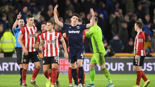 Declan Rice of West Ham United reacts after his hand ball rules Robert Snodgrass of West Ham United (not pictured) goal disallowed by VAR