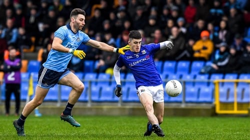 Longford's Iarla O'Sullivan gets a shot away under attention from Dublin's Andy Foley
