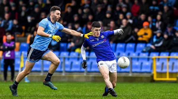 Longford's Iarla O'Sullivan gets a shot away under attention from Dublin's Andy Foley