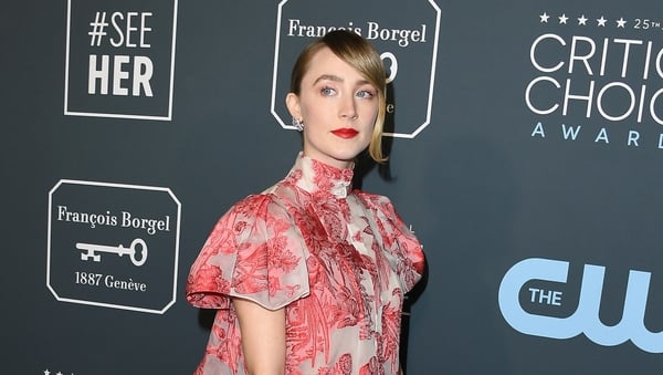 The Irish beauty stunned at the awards show in Los Angeles, mixing up her awards fashion once again in a romantic and feminine gown. 
 Photo: Getty