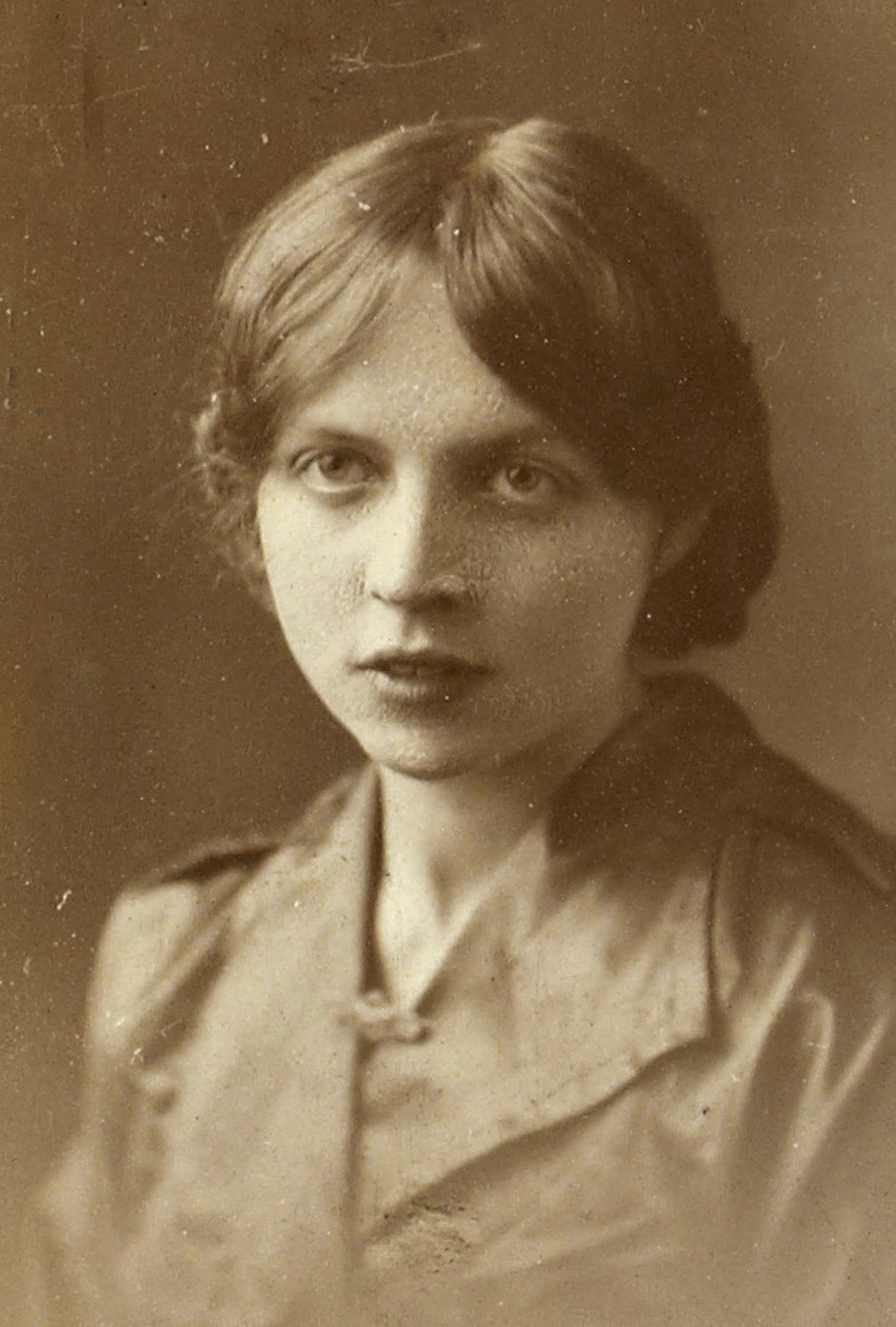 Image - Unknown girl wearing her Cumann na mBan pin. Image courtesy of the National Library of Ireland