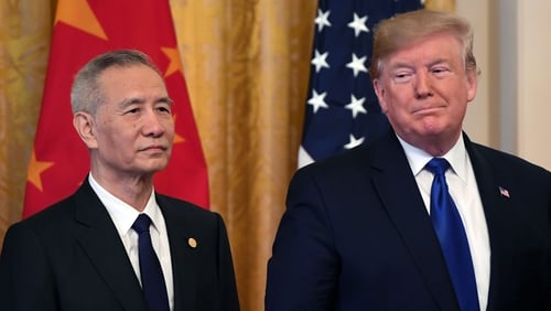 China's top negotiator, vice premier Liu He, and US President Donald Trump signed the trade deal in the White House