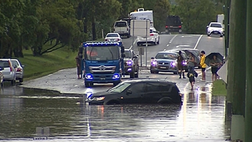 Rain is bucketing down in several areas across Victoria, New South Wales and Queensland