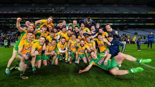 Corofin players celebrate with the Andy Merrigan Cup